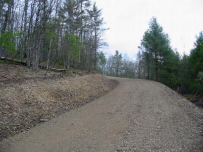 Gentle grade on access road will minimize maintaince costs